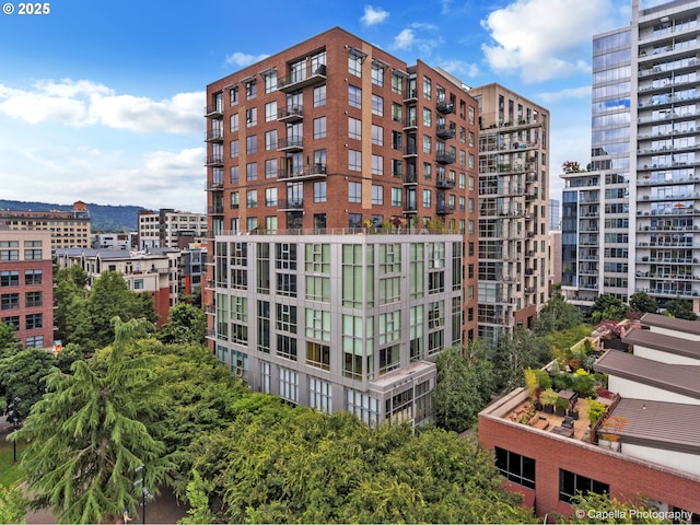 view of building exterior with a city view