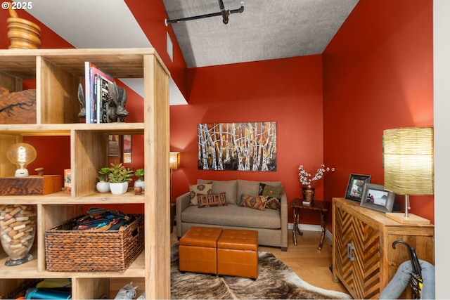 sitting room featuring wood finished floors