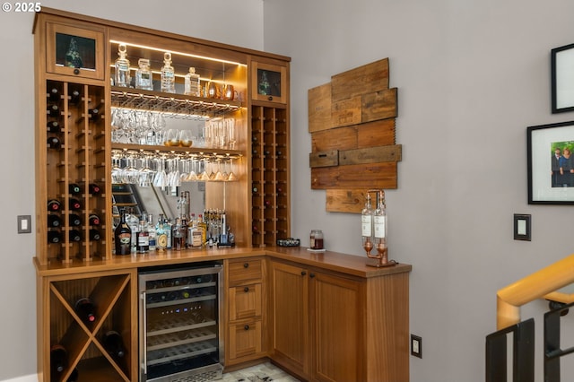 bar with a dry bar and wine cooler