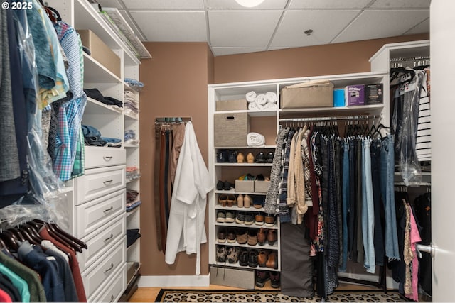 walk in closet featuring a drop ceiling