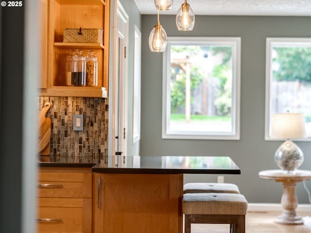 2487 Southslope Way W, Linn, OR 97068 - indoor dry bar with decorative backsplash and decorative light fixtures