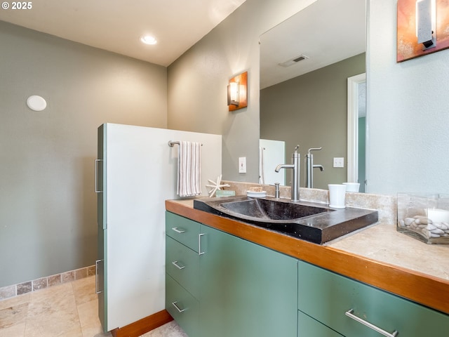 2487 Southslope Way W, Linn, OR 97068 - bathroom featuring vanity, baseboards, and recessed lighting