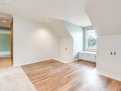 2487 Southslope Way W, Linn, OR 97068 - bonus room with lofted ceiling and wood finished floors