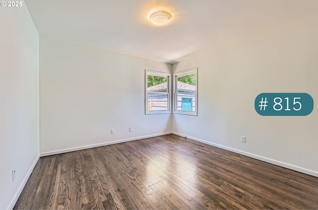 815/821 NE Holman St, Portland, OR 97211 - empty room featuring dark wood-style floors