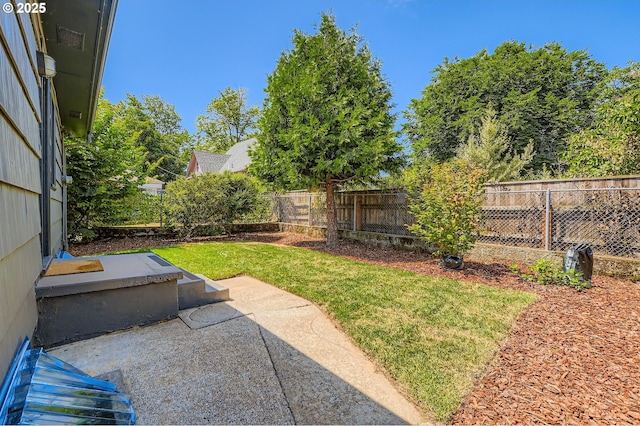 815/821 NE Holman St, Portland, OR 97211 - fenced backyard featuring a patio area