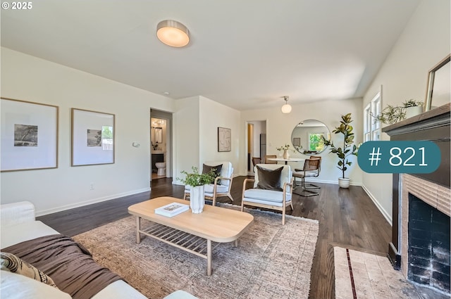 815/821 NE Holman St, Portland, OR 97211 - living area with wood finished floors and a tile fireplace