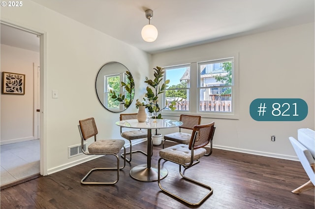 815/821 NE Holman St, Portland, OR 97211 - dining room featuring wood finished floors