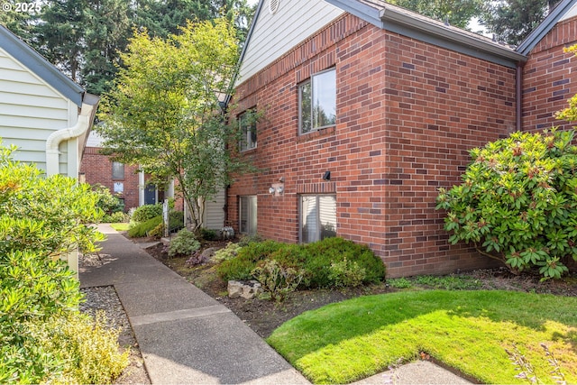 15015 NE Sacramento St Unit 51, Portland, OR 97230 - view of side of home featuring brick siding