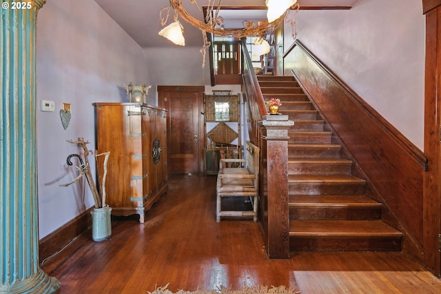 91755 Lewis And Clark Rd, Astoria, OR 97103 - stairway featuring wood finished floors and a high ceiling