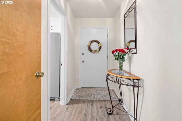 15565 SW 114th Ct Unit 23, Portland, OR 97224 - entryway featuring wood finished floors and baseboards