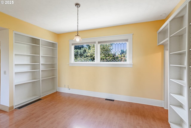 1005 Reserve St, Silverton, OR 97381 - unfurnished room with baseboards and wood finished floors