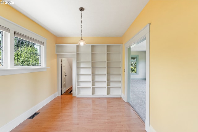 1005 Reserve St, Silverton, OR 97381 - unfurnished dining area with healthy amount of natural light and light wood-style flooring