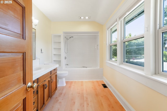 1005 Reserve St, Silverton, OR 97381 - bathroom featuring vanity, plenty of natural light, wood finished floors,  shower combination, and lofted ceiling