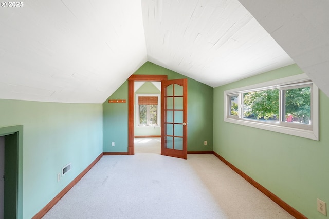 1005 Reserve St, Silverton, OR 97381 - bonus room featuring lofted ceiling, plenty of natural light, and carpet flooring