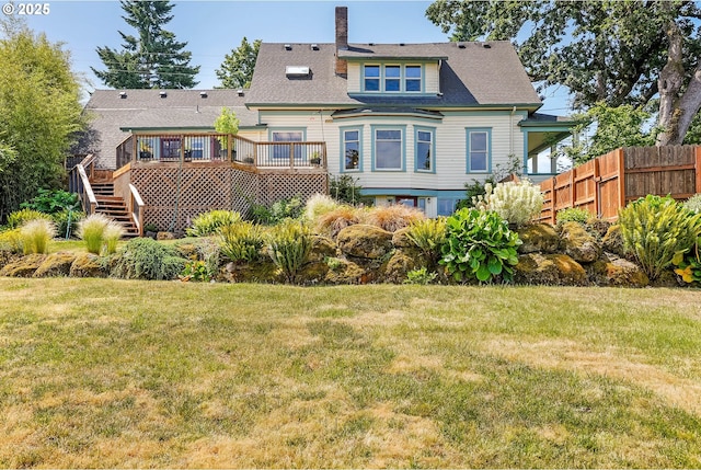 1005 Reserve St, Silverton, OR 97381 - rear view of house with a wooden deck, stairs, a chimney, and a shingled roof