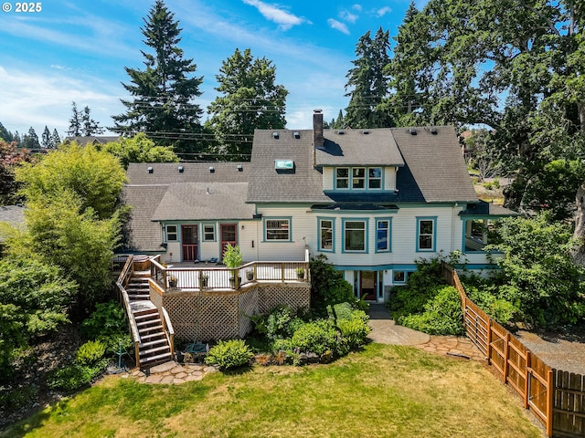 1005 Reserve St, Silverton, OR 97381 - rear view of house featuring stairs, a wooden deck, a shingled roof, and a chimney