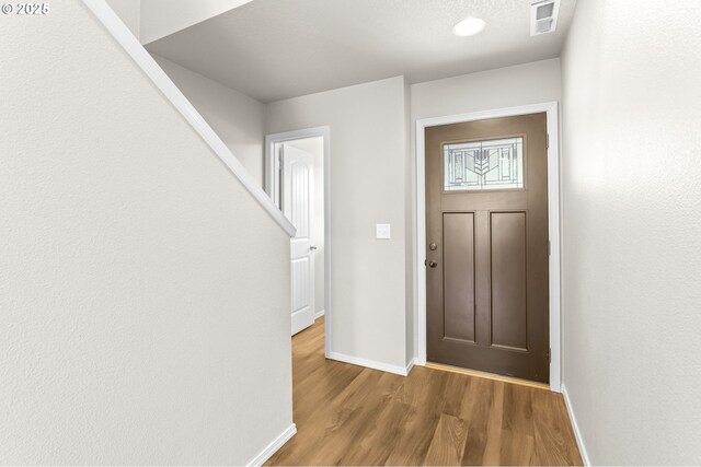 37125 Goldenrain St, Sandy, OR 97055 - foyer entrance with baseboards and wood finished floors