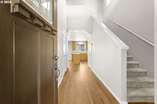 37125 Goldenrain St, Sandy, OR 97055 - foyer entrance with a high ceiling, light wood-style floors, healthy amount of natural light, and stairs