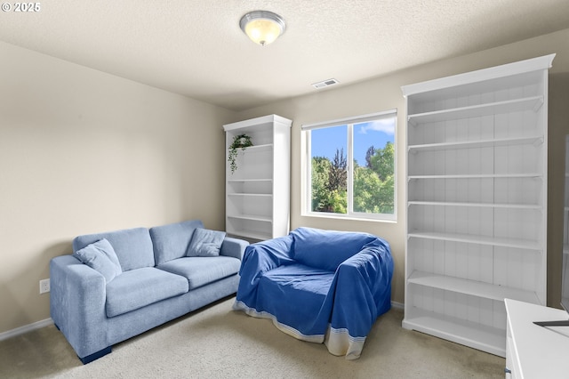 37125 Goldenrain St, Sandy, OR 97055 - carpeted living area with a textured ceiling and baseboards