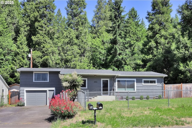 48521 E 1st St, Oakridge, OR 97463 - ranch-style home with a garage and asphalt driveway