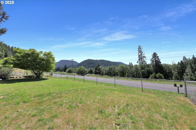 48521 E 1st St, Oakridge, OR 97463 - view of yard featuring a mountain view and a rural view