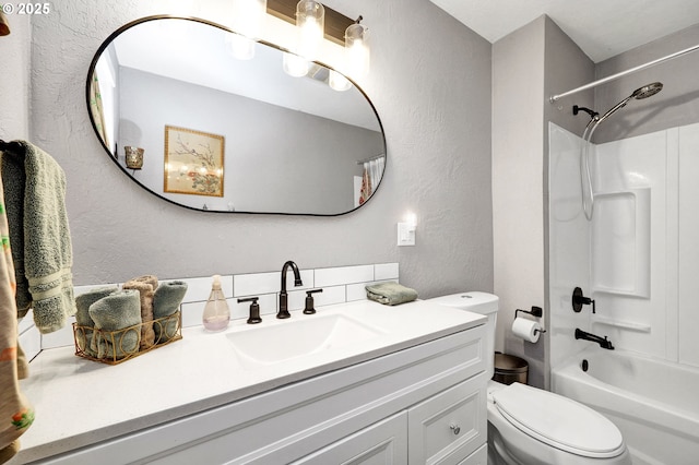 48521 E 1st St, Oakridge, OR 97463 - full bathroom with a textured wall, vanity, toilet, and shower / tub combo