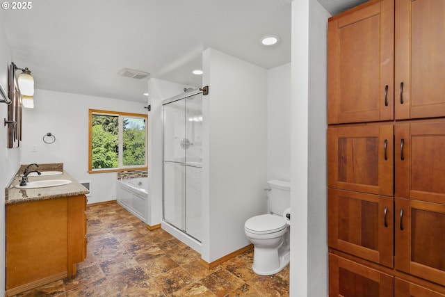 9275 SE Terrace View Ct, Amity, OR 97101 - bathroom featuring a stall shower, a garden tub, double vanity, recessed lighting, and stone finish flooring