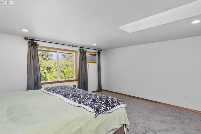 9275 SE Terrace View Ct, Amity, OR 97101 - carpeted bedroom featuring a skylight, recessed lighting, and a wall mounted air conditioner