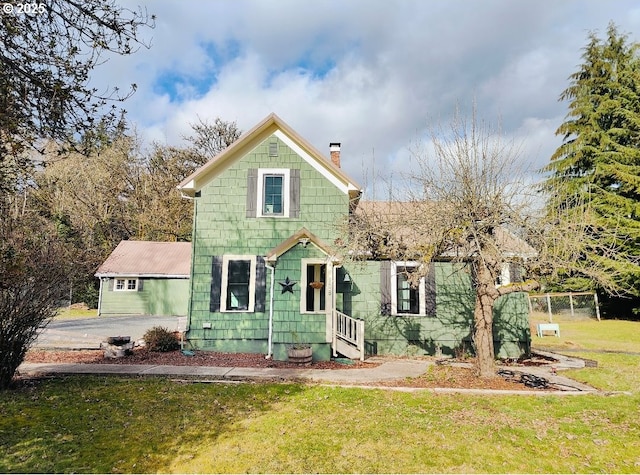 view of front of house with a front yard