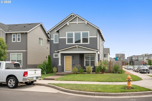 833 S 25th Ter, Cornelius, OR 97113 - view of front of home with a front lawn and a residential view