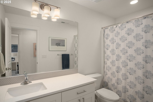 833 S 25th Ter, Cornelius, OR 97113 - bathroom featuring vanity, recessed lighting, decorative backsplash, and curtained shower