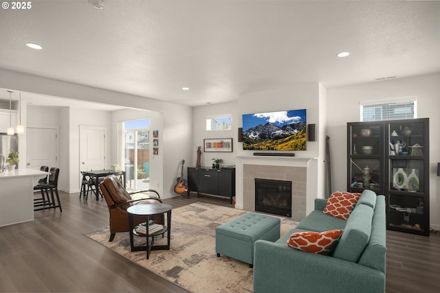 833 S 25th Ter, Cornelius, OR 97113 - living area with dark wood-style floors, recessed lighting, and a tile fireplace