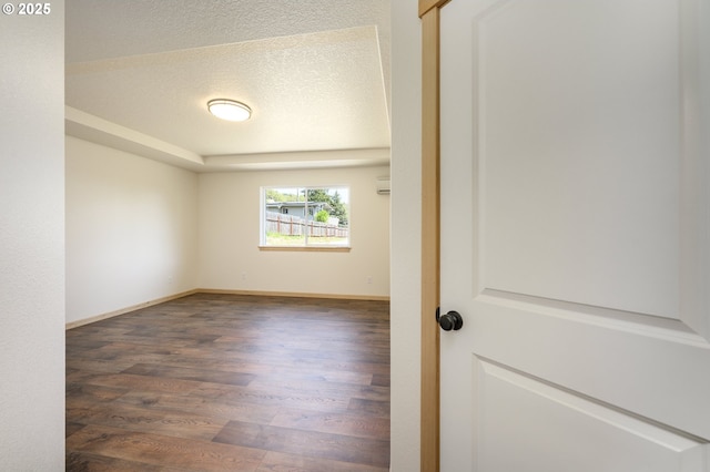 440 NW Gutbrod St, Sheridan, OR 97378 - empty room with a textured ceiling, wood finished floors, and baseboards