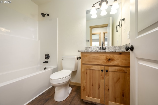 440 NW Gutbrod St, Sheridan, OR 97378 - full bathroom with washtub / shower combination, wood finished floors, toilet, and vanity