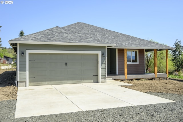 440 NW Gutbrod St, Sheridan, OR 97378 - view of front of property with a porch, concrete driveway, a shingled roof, and a garage