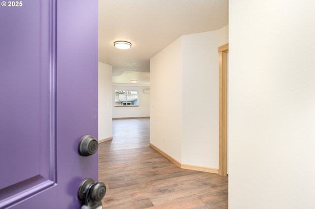440 NW Gutbrod St, Sheridan, OR 97378 - hallway featuring wood finished floors and baseboards