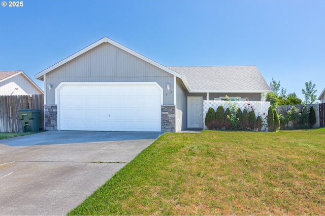517 Anthony Dr, Boardman, OR 97818 - ranch-style home featuring stone siding, driveway, and an attached garage
