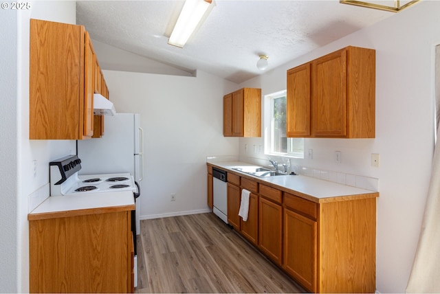 517 Anthony Dr, Boardman, OR 97818 - kitchen with a sink, light wood-style floors, lofted ceiling, light countertops, and white appliances