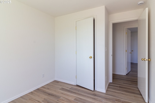 517 Anthony Dr, Boardman, OR 97818 - unfurnished bedroom with light wood-style flooring and baseboards