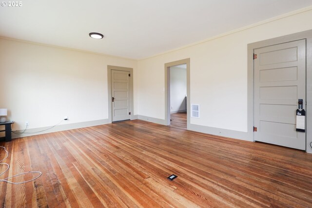 22621 Noti Loop, Noti, OR 97461 - unfurnished living room featuring hardwood / wood-style flooring, crown molding, and baseboards