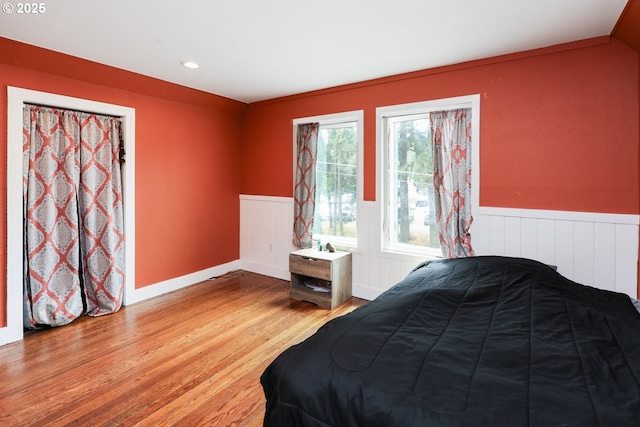 22621 Noti Loop, Noti, OR 97461 - bedroom with a wainscoted wall, wood finished floors, and recessed lighting