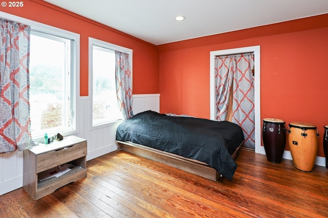 22621 Noti Loop, Noti, OR 97461 - bedroom featuring a wainscoted wall, hardwood / wood-style flooring, and recessed lighting