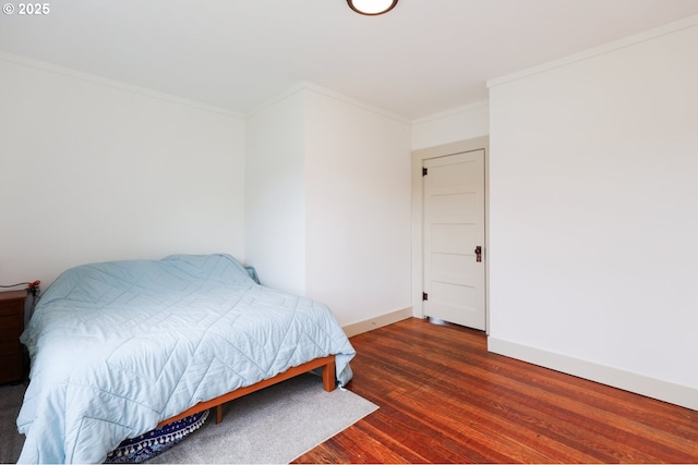 22621 Noti Loop, Noti, OR 97461 - bedroom featuring wood finished floors, ornamental molding, and baseboards