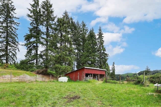 22621 Noti Loop, Noti, OR 97461 - view of yard featuring an outdoor structure and an outbuilding