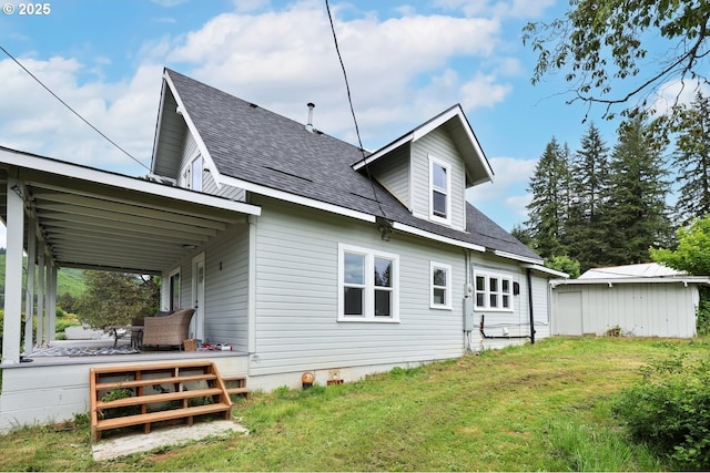 22621 Noti Loop, Noti, OR 97461 - back of property featuring a shingled roof and a yard