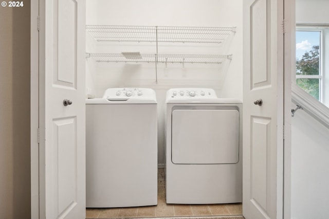laundry area with washing machine and dryer and laundry area