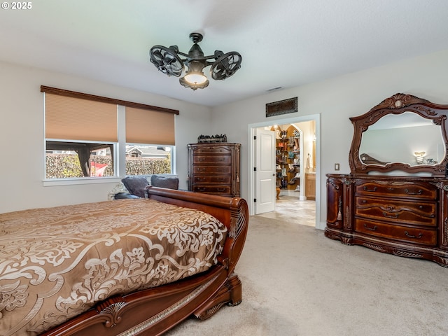 carpeted bedroom with visible vents