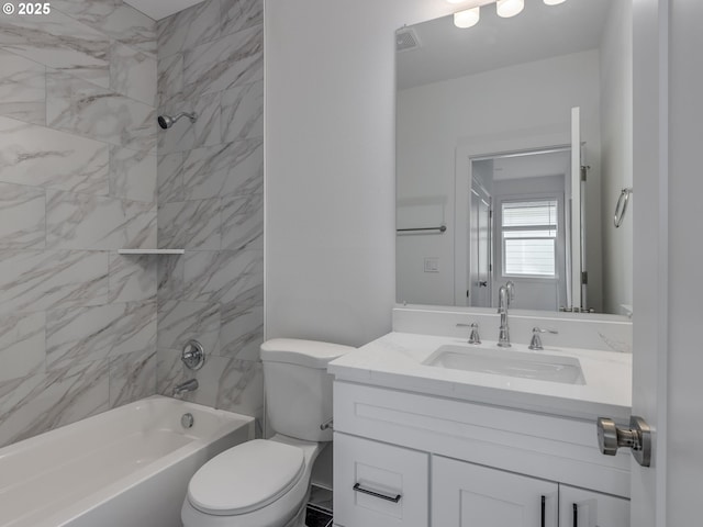 bathroom with vanity, toilet, bathing tub / shower combination, and visible vents