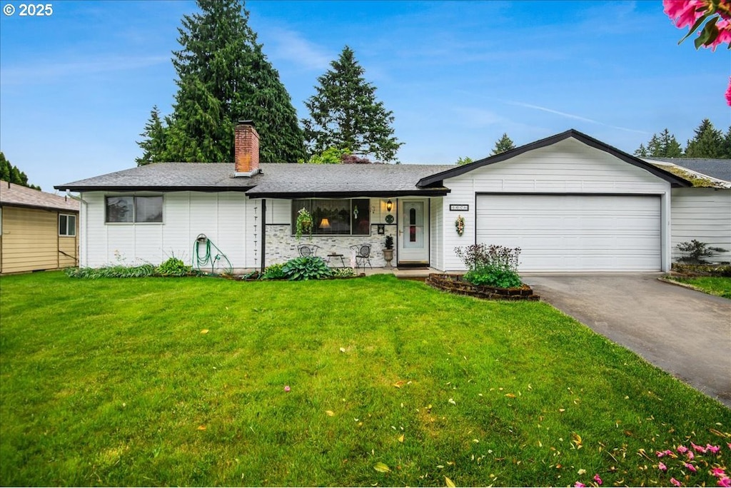 107 NE 102nd St, Vancouver, WA 98685 - ranch-style home with a front yard, an attached garage, driveway, and a chimney