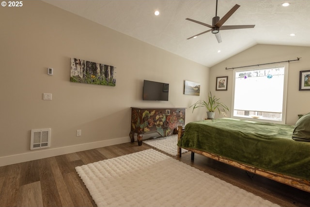 bedroom with baseboards, visible vents, wood finished floors, vaulted ceiling, and recessed lighting